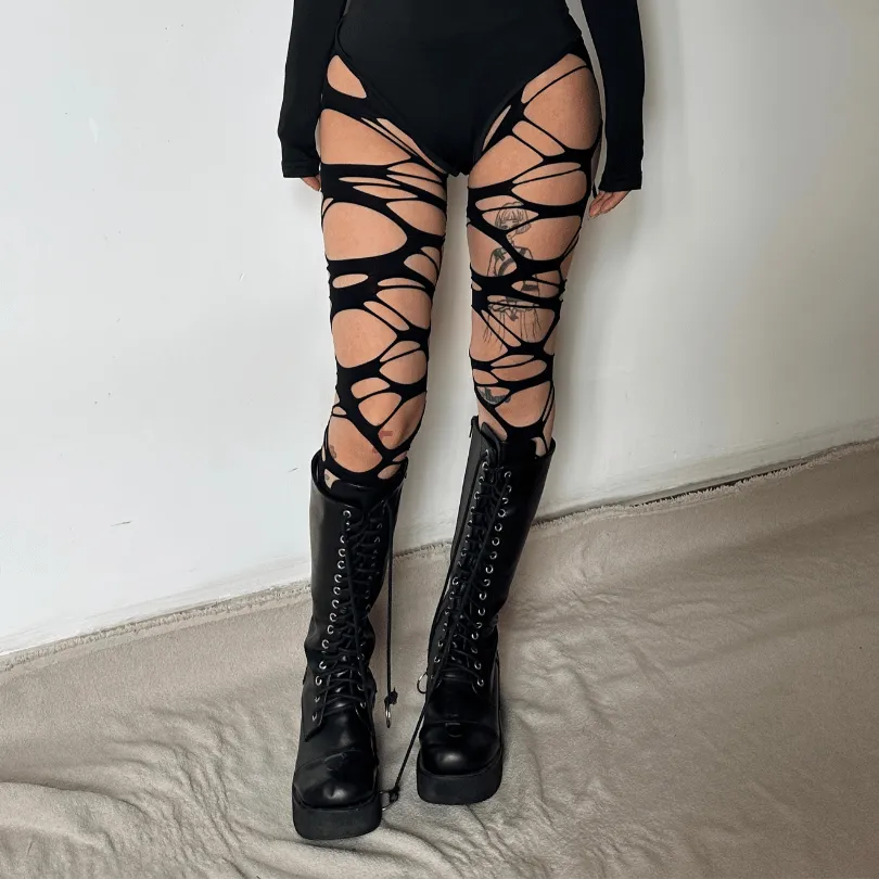 Hollow out irregular tights